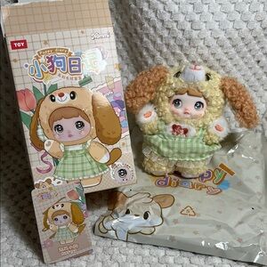 Nommi Puppy Diaries Vinyl Face Pendant